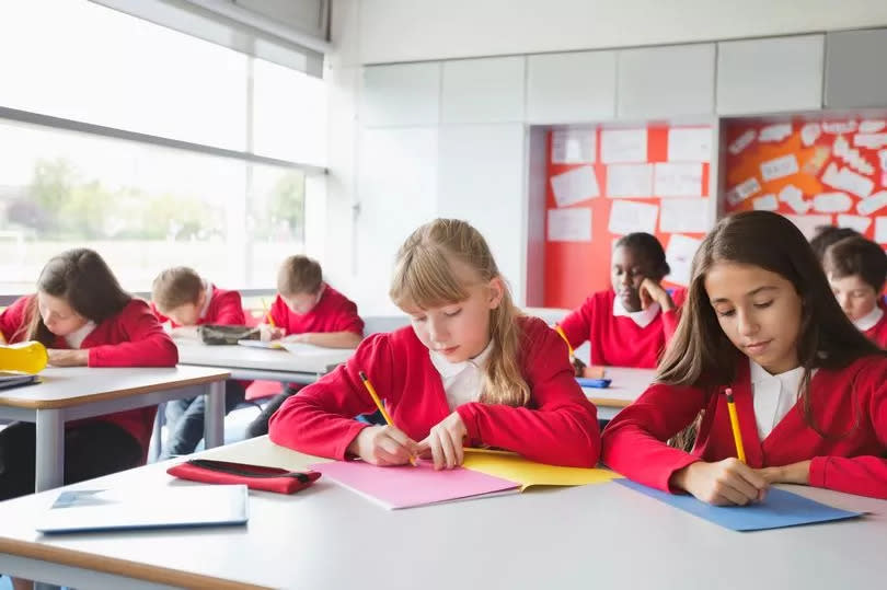 Kids working in the classroom