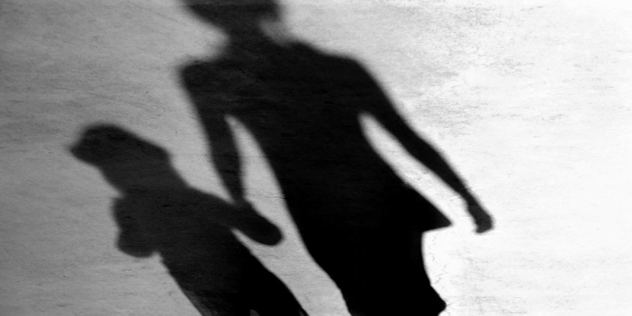 mother child shadows walking