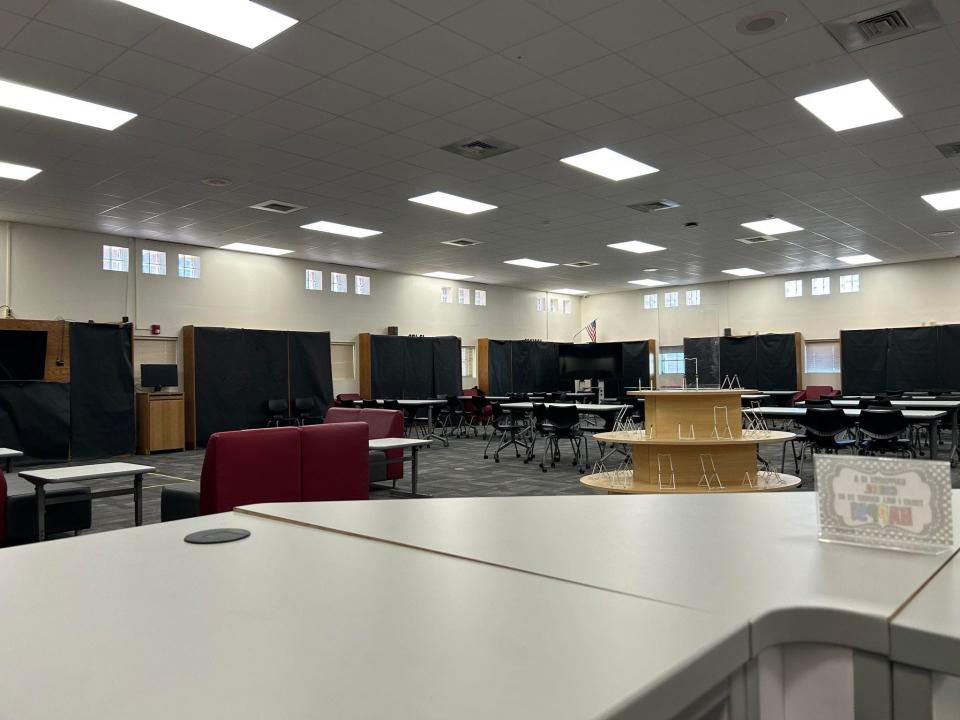 Pensacola High School has books visibly covered up with black paper on Aug. 17.