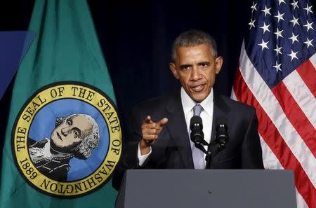 U.S. President Barack Obama speaks about gun violence in America during a Democratic fundraiser for Senator Patty Murray in Seattle, Washington October 9, 2015. A few hours earlier, Obama met with family members of the victims of last week's shooting rampage in Oregon. REUTERS/Kevin Lamarque