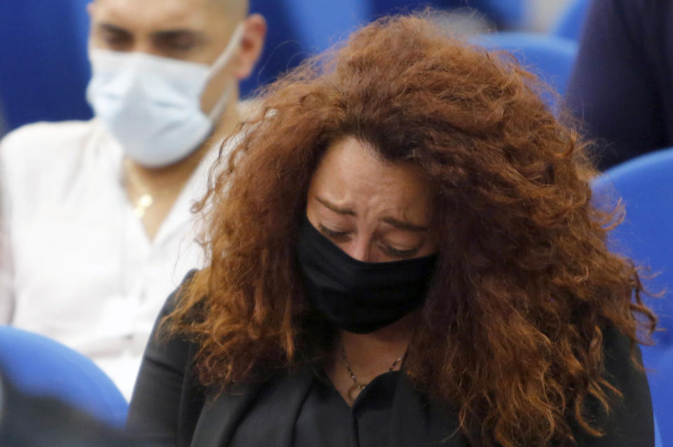 FILE - Rosa Maria Esilio, widow of Italian Carabinieri paramilitary police officer Mario Cerciello Rega, attends a hearing of the trial for his murder, in Rome, July 15, 2020. Two American men face a new trial Friday March 8, 2024, in the slaying of an Italian plainclothes police officer during a botched sting operation after Italy’s highest court threw out their convictions. (AP Photo/Riccardo De Luca, file)