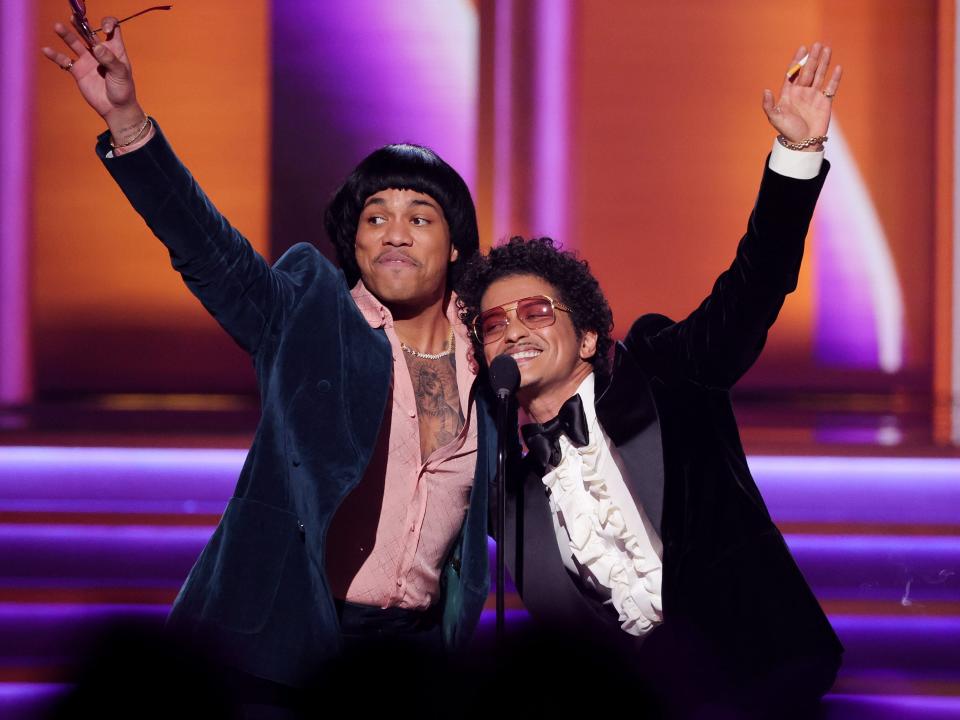 Anderson .Paak and Bruno Mars of Silk Sonic accepting the award for record of the year at the 2022 Grammys.