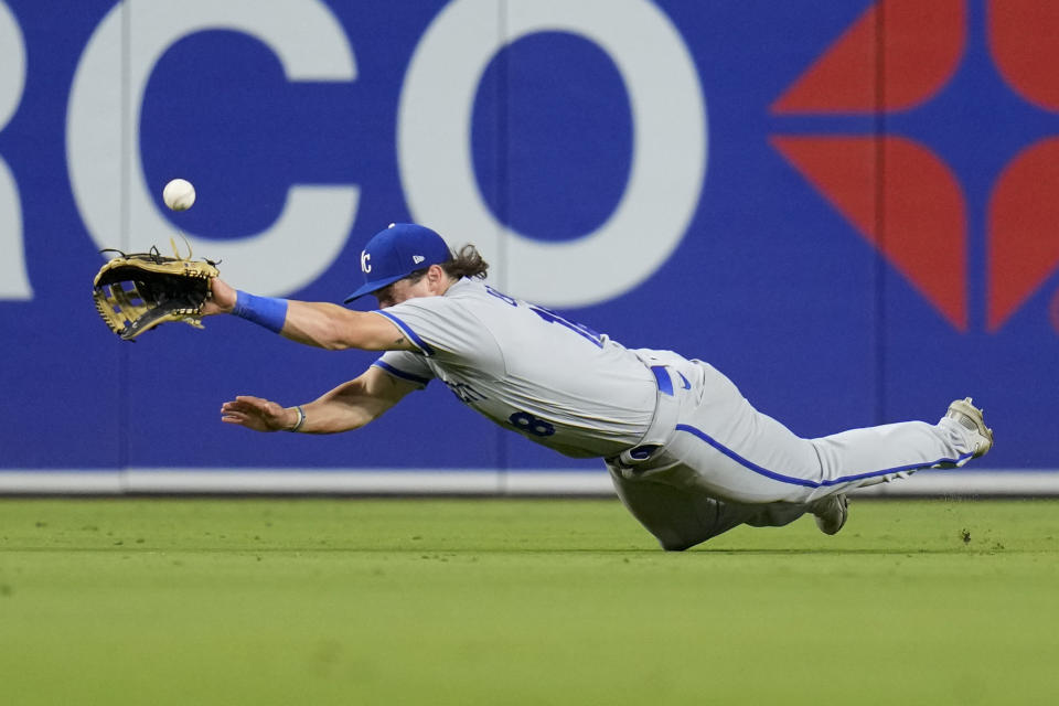 Kansas City Royals center fielder Nate Eaton can't make the catch on a double hit by San Diego Padres' Matt Carpenter during the sixth inning of a baseball game Tuesday, May 16, 2023, in San Diego. (AP Photo/Gregory Bull)