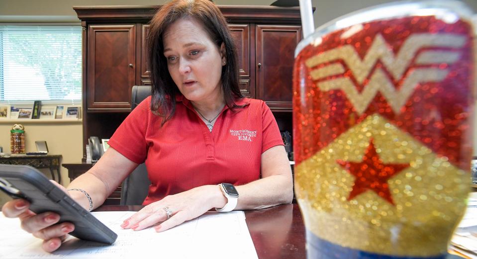 Christina Thornton, Montgomery Emergency Management Agency Director, is shown with her Wonder Woman mug in Montgomery, Ala., on Monday March 27, 2023,