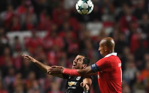 Luisao was booked for clotheslining Mkhitaryan - Credit: FRANCISCO LEONG/AFP/Getty Images