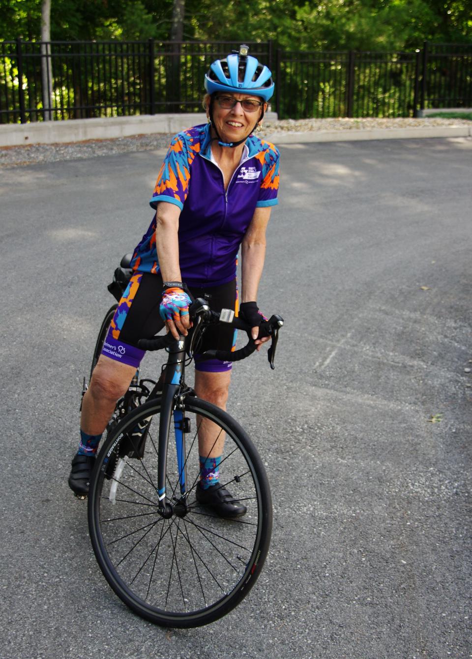 Ann Whaley-Tobin, of Easton, takes a pause in an afternoon workout with bike riding on Wednesday, July 13, 2022. Whaley-Tobin rides regularly to raise funds for Alzheimer's research.