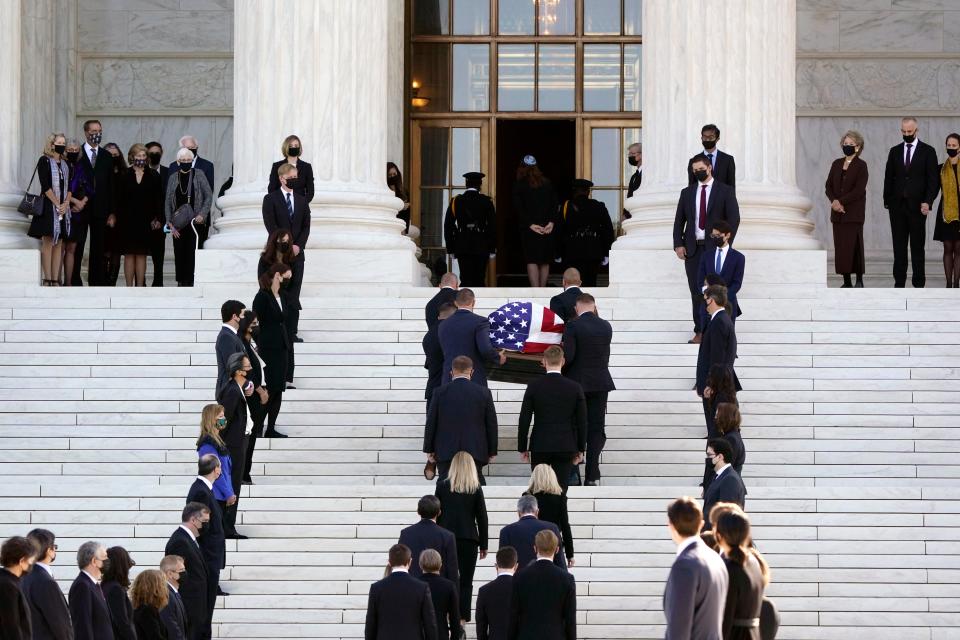 The flag-draped casket of Justice Ruth Bader Ginsburg arrives at the Supreme Court in Washington, Wednesday, Sept. 23, 2020. Ginsburg, 87, died of cancer on Sept. 18. (AP Photo/J. Scott Applewhite) ORG XMIT: DCSA213