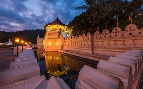 The Temple of the Sacred Tooth Relic in Sri Lanka - Credit: yotrak/yotrak
