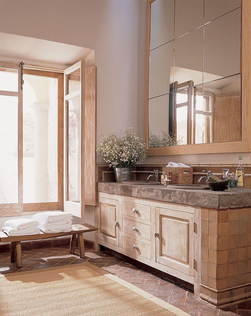 a bathroom with a large mirror