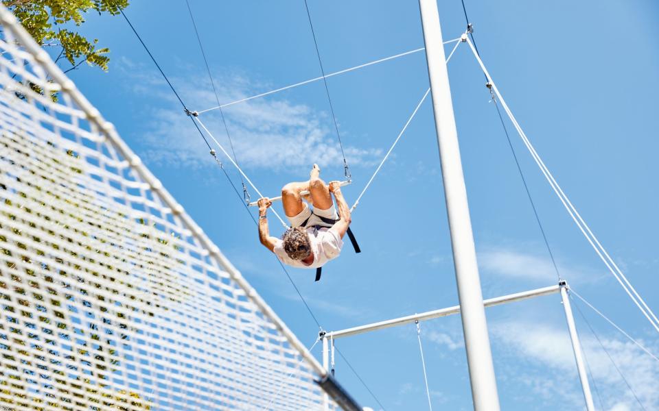 Trapeze is one of many activities on offer at Club Med Magna Marbella