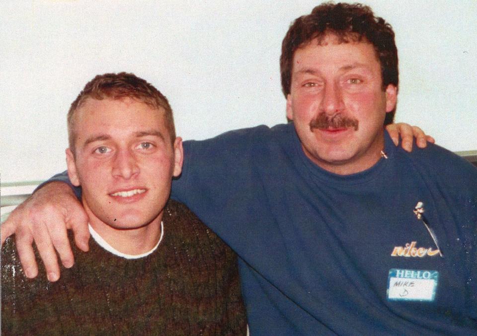 Joel Stephens, left, and Mike D'Aloisio pose for a photo at a benefit fundraiser for Stephens in January of 1998.