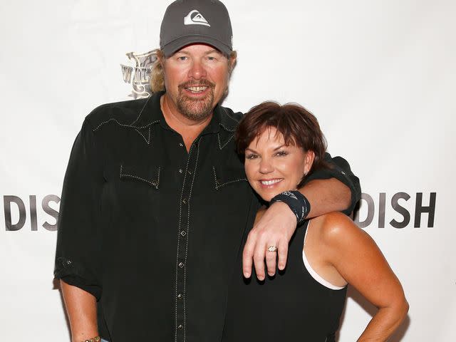 <p>Isaac Brekken/Getty</p> Toby Keith and Tricia Covel attend the SwingDish Launch Event on August 18, 2015 in Las Vegas, Nevada.