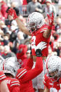 Ohio State receiver Chris Olave celebrates his touchdown against Michigan State during the first half of an NCAA college football game Saturday, Nov. 20, 2021, in Columbus, Ohio. (AP Photo/Jay LaPrete)