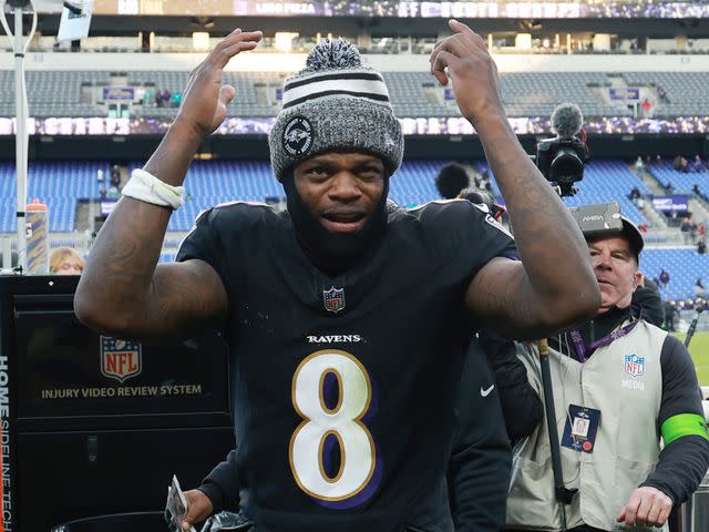 <p>Rob Carr/Getty</p> Lamar Jackson after defeating the Miami Dolphins at M&T Bank Stadium on December 31, 2023 in Baltimore, Maryland.