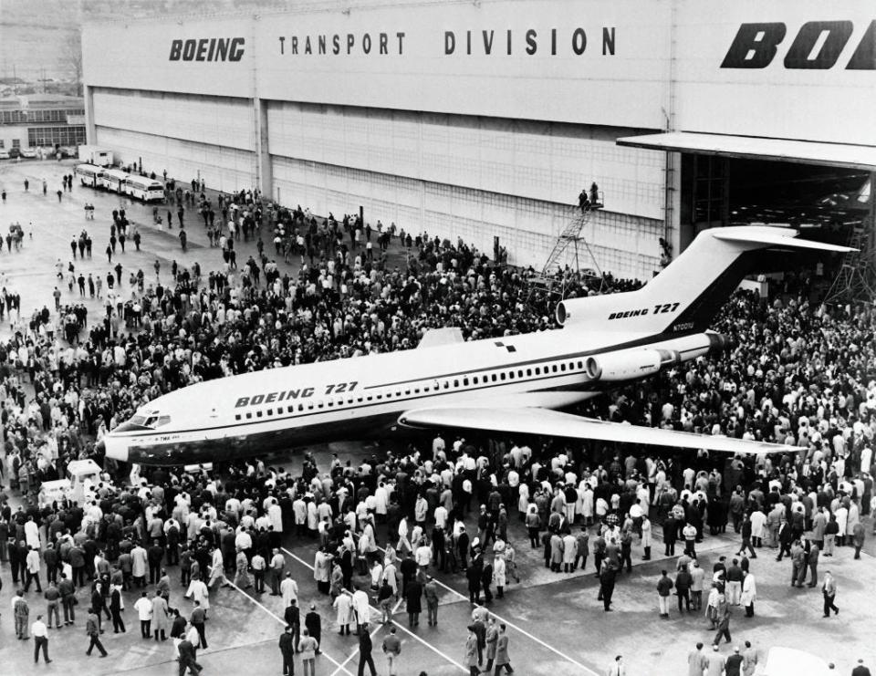 People gather for the first view of the new Boeing 727 jet airliner, developed for the short-to-medium haul market, on December 01, 1962 at Seattle, Washington.