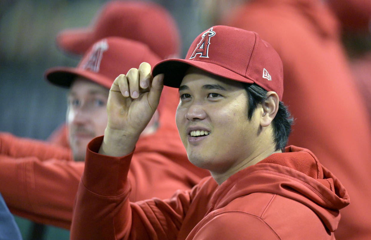 ANAHEIM, CALIFORNIA - SEPTEMBER 16: Shohei Ohtani sits on the bench in the seventh inning during a game against the Detroit Tigers at Angel Stadium of Anaheim on September 16, 2023 in Anaheim, California. (Photo by John McCoy/Getty Images)