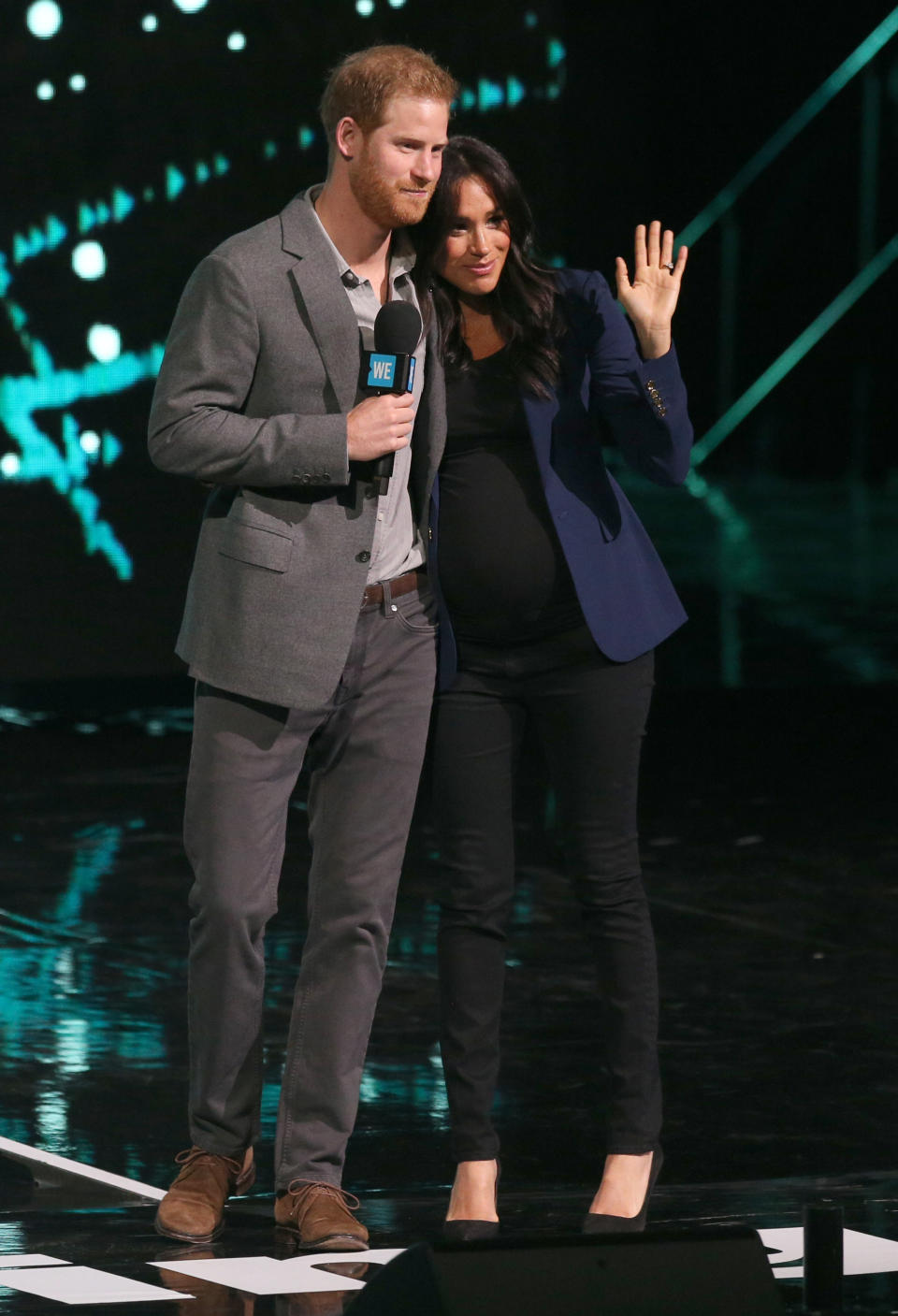 For a surprise appearance at WE Day with Harry, Meghan dressed her bump in a black Misha Nonoo t-shirt, Rag & Bone maternity jeans and a £527.37 Smythe blazer. [Photo: PA]