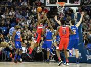 Jan 17, 2019; London, United Kingdom; Washington Wizards guard Bradley Beal (3) shoots against New York Knicks guard Emmanuel Mudiay (1) during the third quarter at The O2 Arena. Mandatory Credit: Steve Flynn-USA TODAY Sports