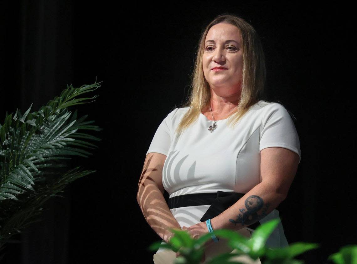 Broward School Board vice chair Lori Alhadeff stands after being sworn in by her husband, Dr. Ilan Alhadeff, during the swearing- in of five newly elected Broward School Board members on Tuesday, Nov. 22, 2022, at Fort Lauderdale High School.