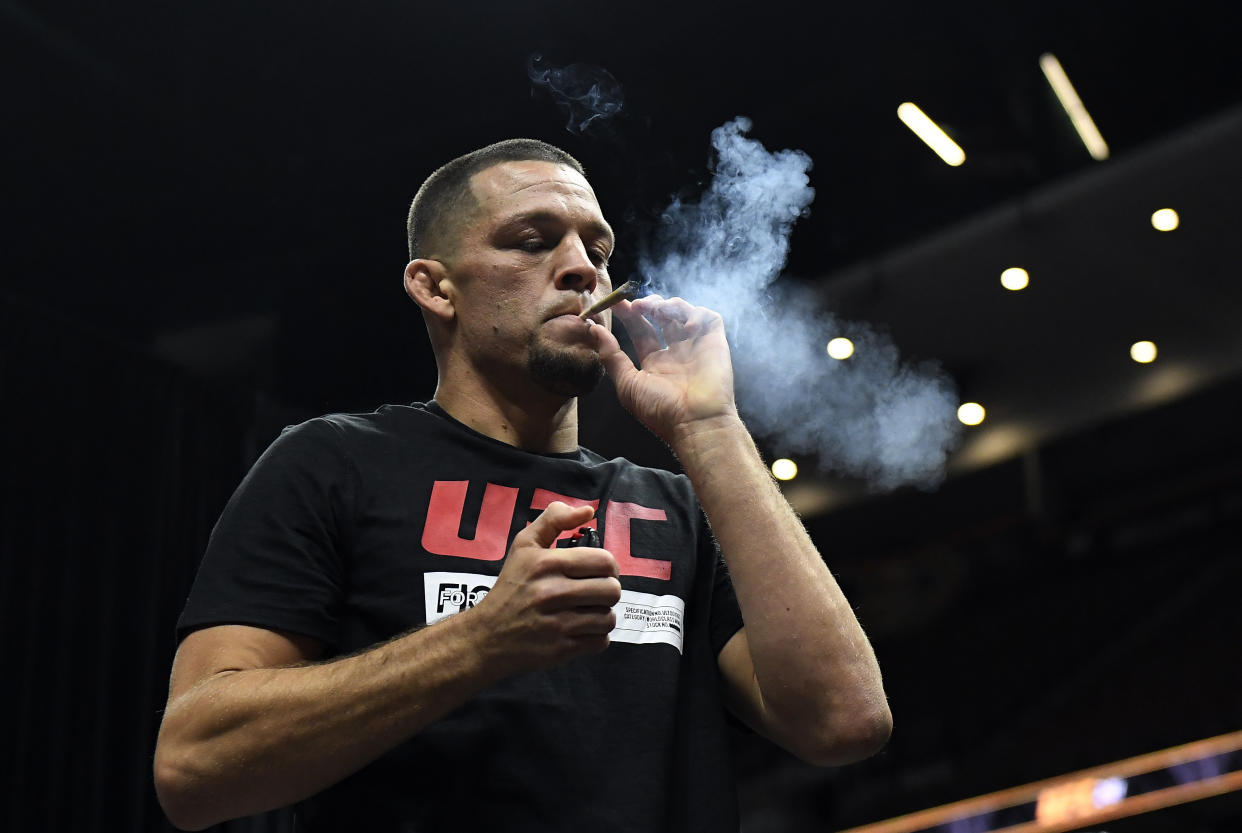 ANAHEIM, CA - AUGUST 14: Former UFC lightweight title challenger Nate Diaz smokes during an open workout for fans and media at Honda Center on August 14, 2019 in Anaheim, California. (Photo by Kevork Djansezian/Zuffa LLC/Zuffa LLC)