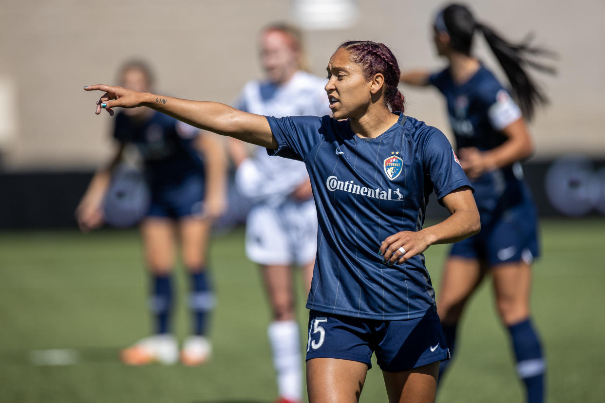 HERRIMAN, UT - JULY 17: Jaelene Daniels #15 of North Carolina Courage instructs team during a game between Portland Thorns FC and North Carolina Courage at Zions Bank Stadium on July 17, 2020 in Herriman, Utah. (Photo by Bryan Byerly/ISI Photos/Getty Images).