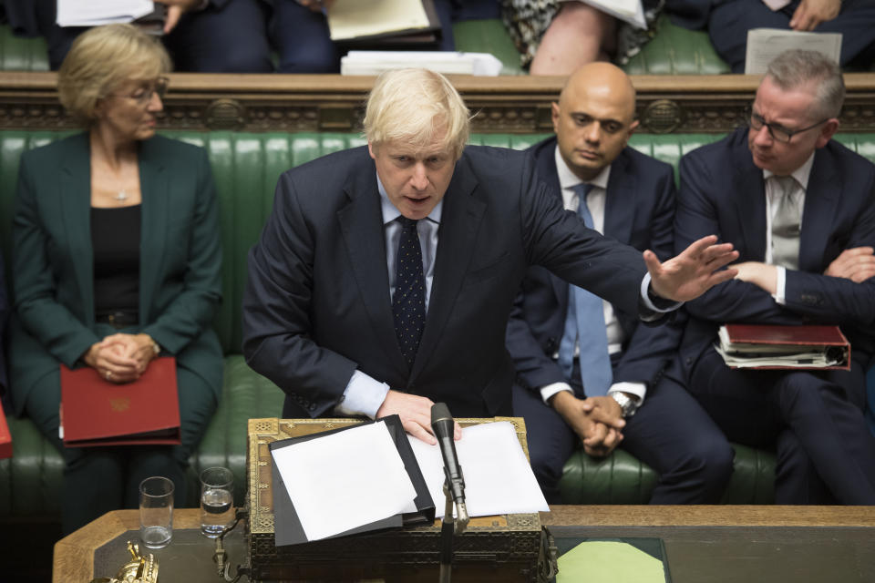 In this image released by the House of Commons, Britain's Prime Minister Boris Johnson speaks in the House of Commons, London, Tuesday Sept. 3, 2019. British Prime Minister Boris Johnson suffered key defections from his party Tuesday, losing a working majority in Parliament and weakening his position as he tried to prevent lawmakers from blocking his Brexit plans. (Jessica Taylor/House of Commons via AP)