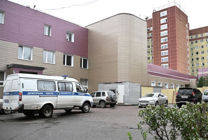 A police vehicle is seen parked outside a hospital where Russian opposition leader Navalny was admitted, in Omsk