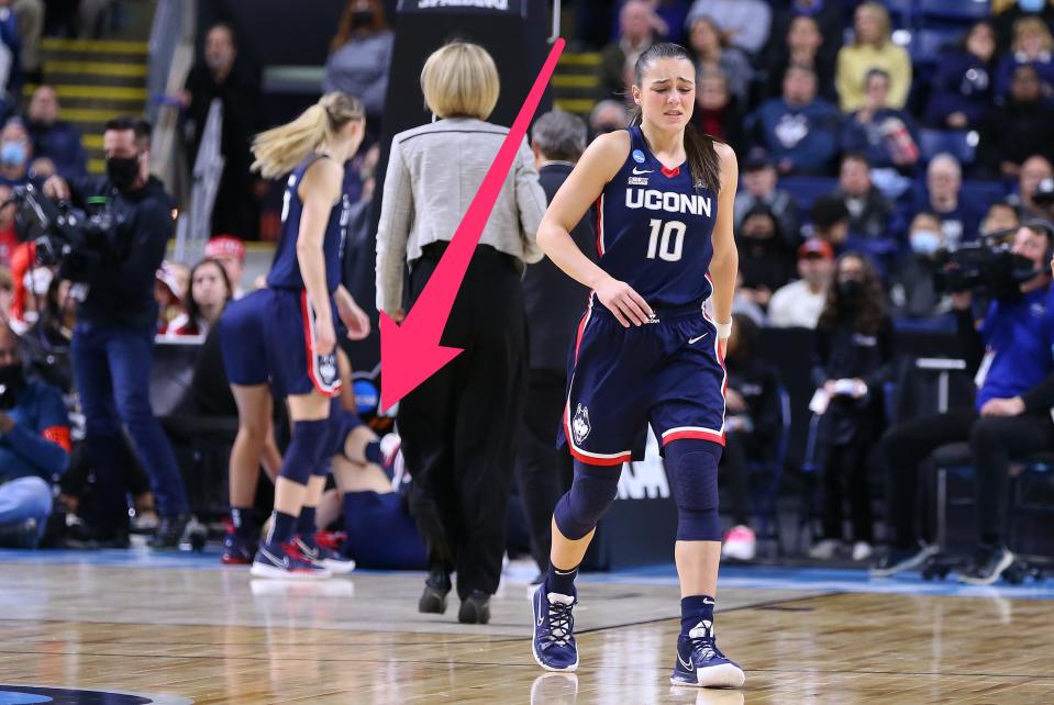 UConn's Nika Muhl reacts after witnessing teammate Dorka Juhasz's gruesome wrist injury.