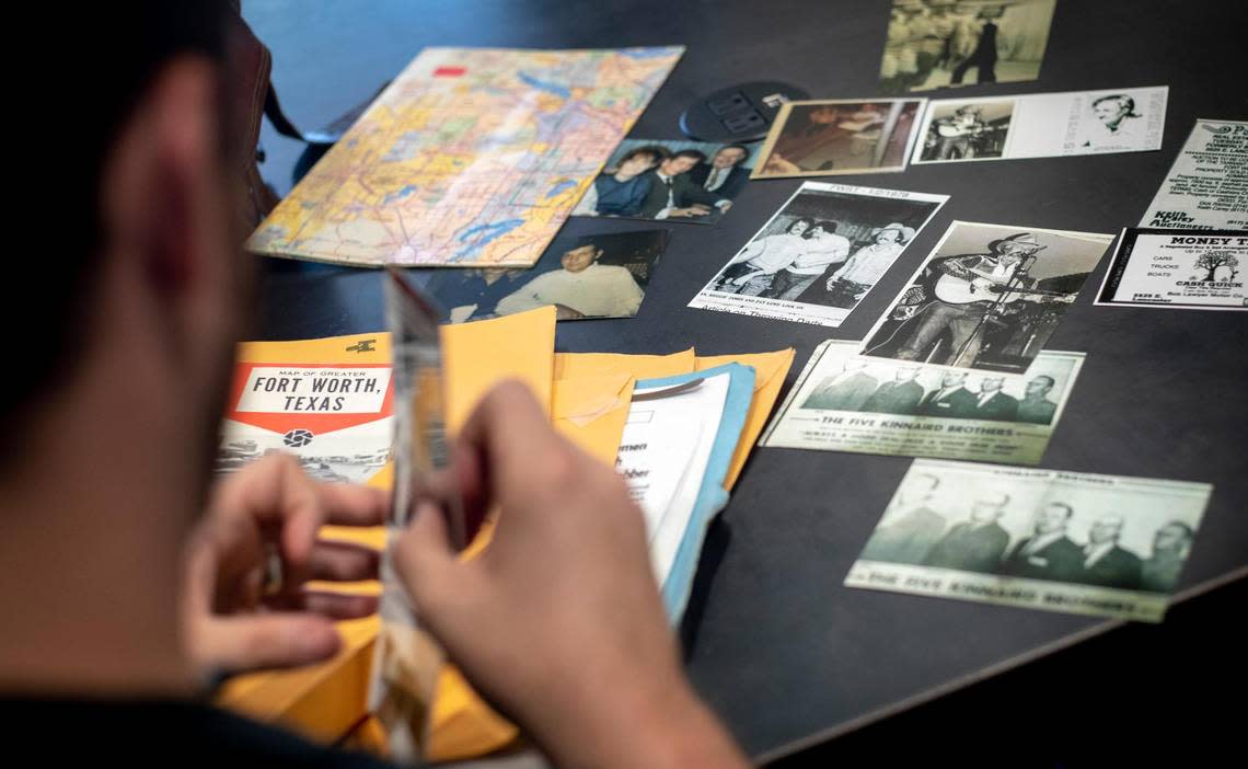 Private investigator Matt Budjenska flips through documents he gathered to research the 1977 slaying of Robert Matt Kevil Jr., in Fort Worth, Texas, on July 13, 2022. Budjenska was hired in 2020 to investigate the cold case after no arrests were made for decades.