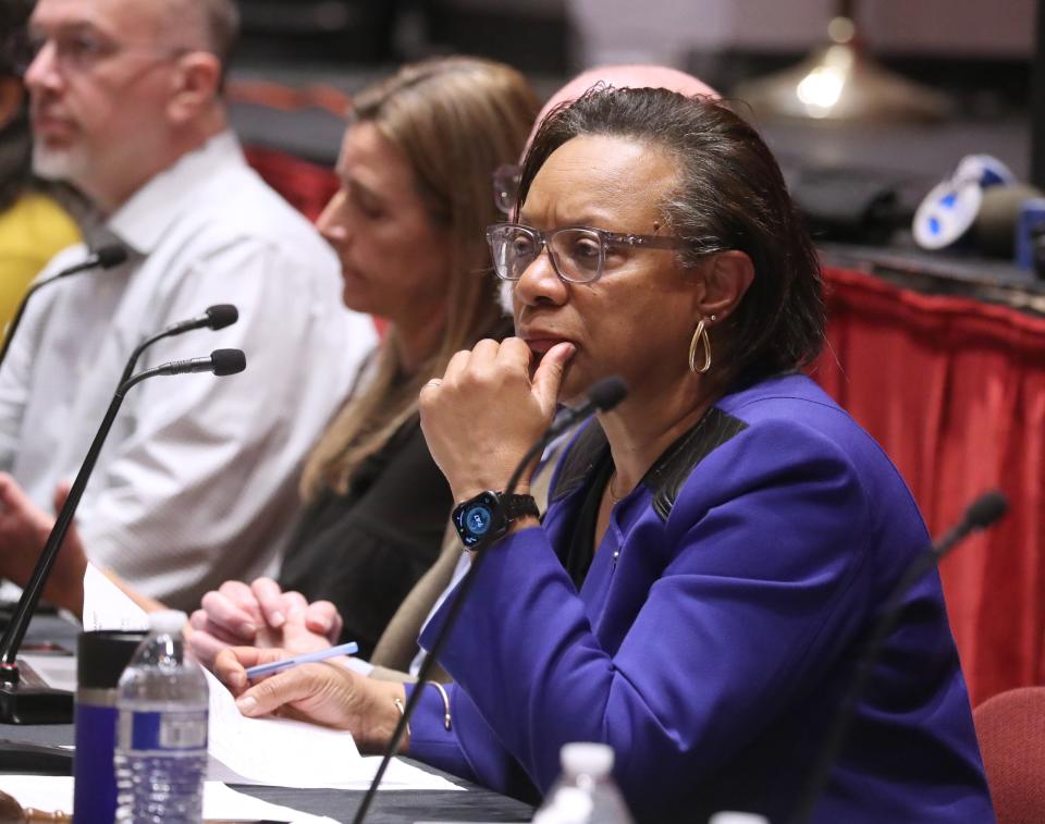 Nyack School Board President Karen Hughes listens to public comment during a public meeting at Nyack High School Jan. 23, 2024. A resolution was approved to remove the name of former head coach Dave Siegriest's from the baseball field and other sites.