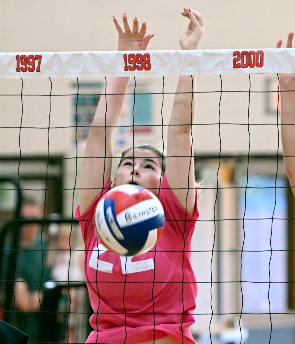 Lillie Ells of Barnstable blocks the ball back at Old Rochester during a scrimmage.