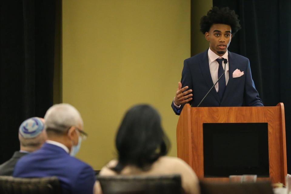 Youth Presenter Jacob Crutchfield-Jones makes his remarks during the Greater Framingham Community Church's annual Martin Luther King Jr. Breakfast at the Verve Hotel in Natick, Jan. 17, 2022.