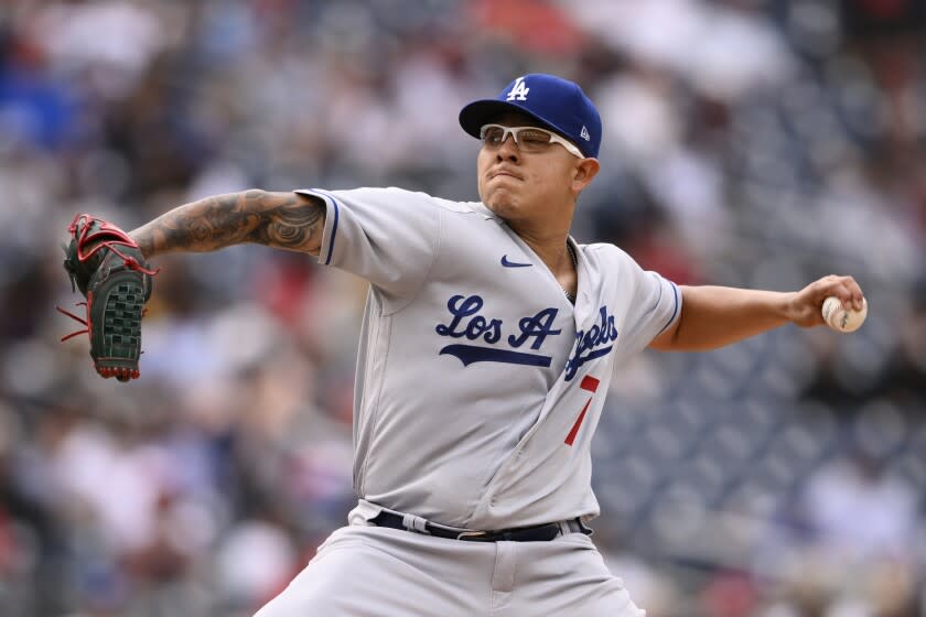 Los Angeles Dodgers starting pitcher Julio Urias throws during the second inning of a baseball game against the Washington Nationals, Wednesday, May 25, 2022, in Washington. (AP Photo/Nick Wass)