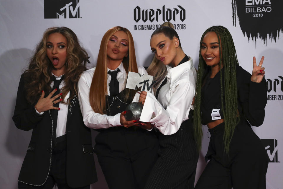 Little Mix pose with their Best UK & Ireland award during the 2018 MTV Europe Music Awards at Bilbao Exhibition Centre in Bilbao, Spain, November 4, 2018. REUTERS/Sergio Perez