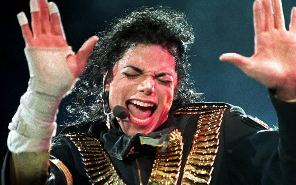 Michael Jackson performing during his Dangerous tour in 1993 - AFP