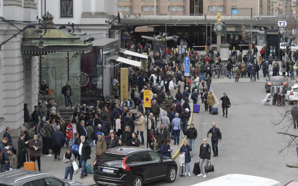 Police evacuate Stockholm's central station - Credit: Anders Wiklund /AFP