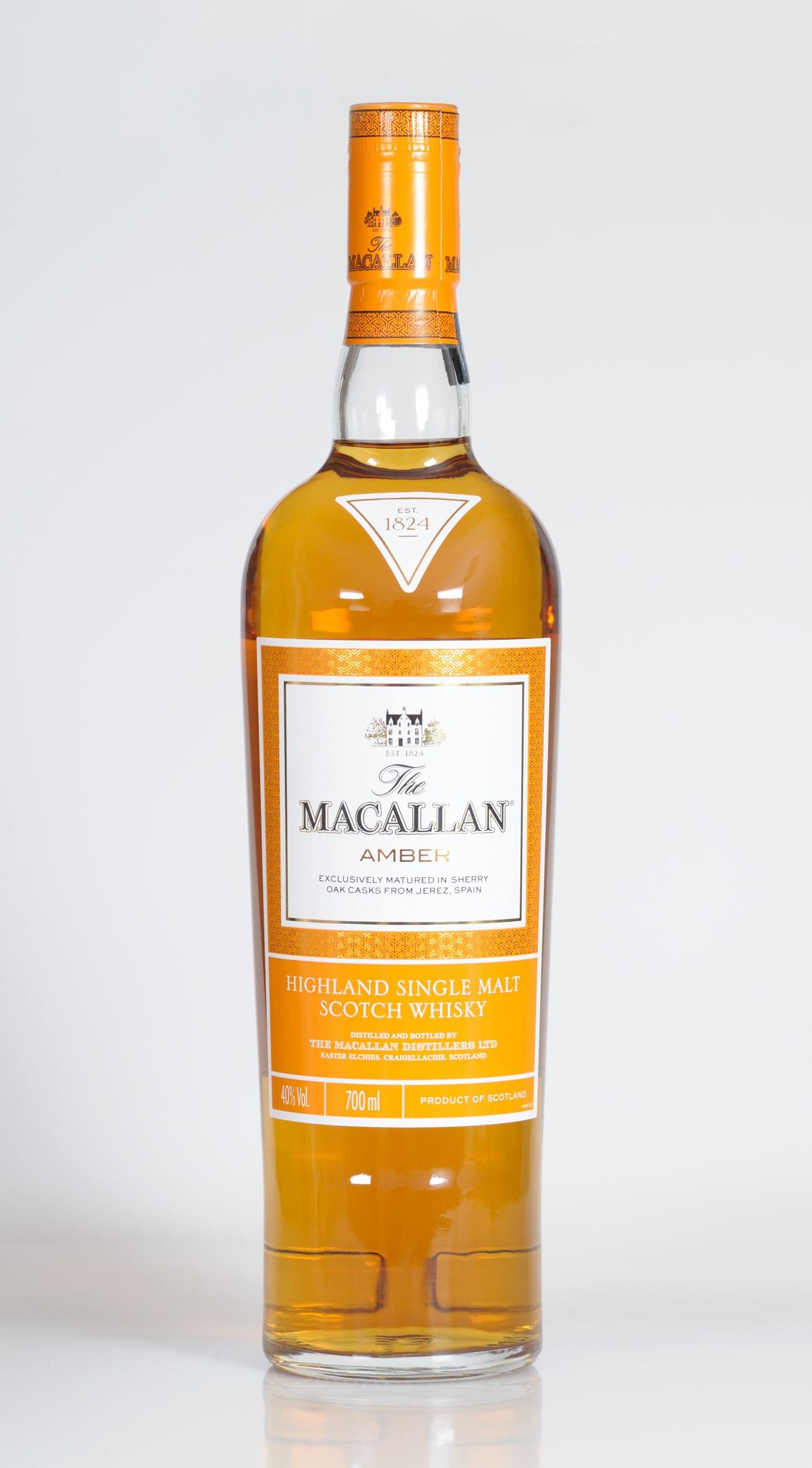 Mistelbach, Germany – October 12, 2014: Bottle of a Scottish single malt whisky named Amber from the distillery Macallan, situated in the Scottish highlands.