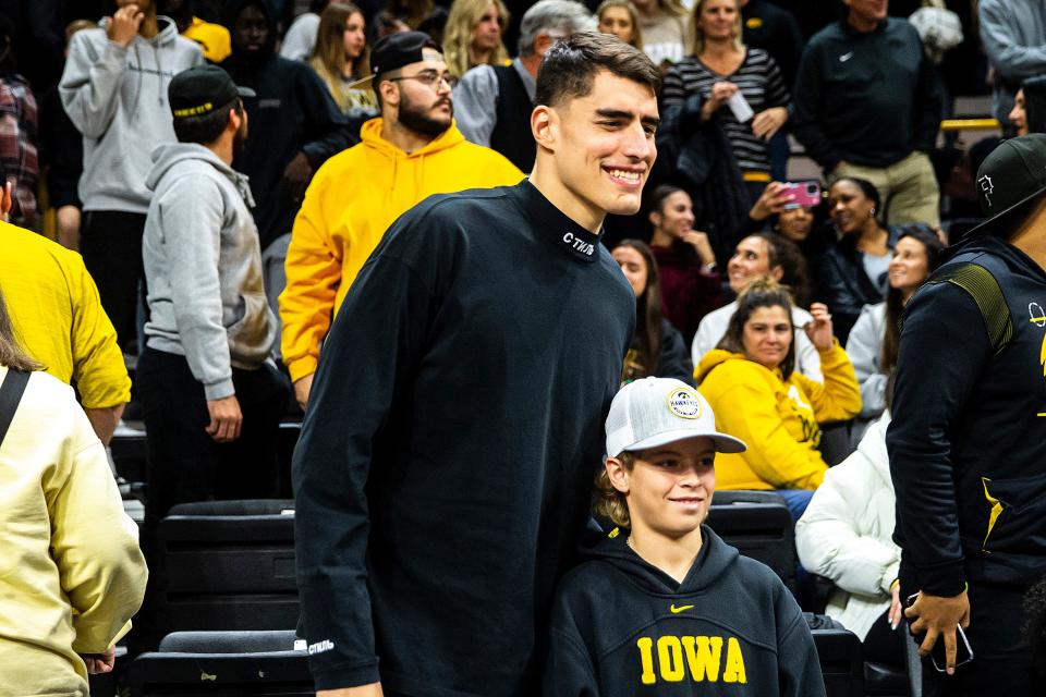 Former Iowa basketball star Luka Garza is expected to play in the season opener for the Iowa Wolves on Friday at Wells Fargo Arena.