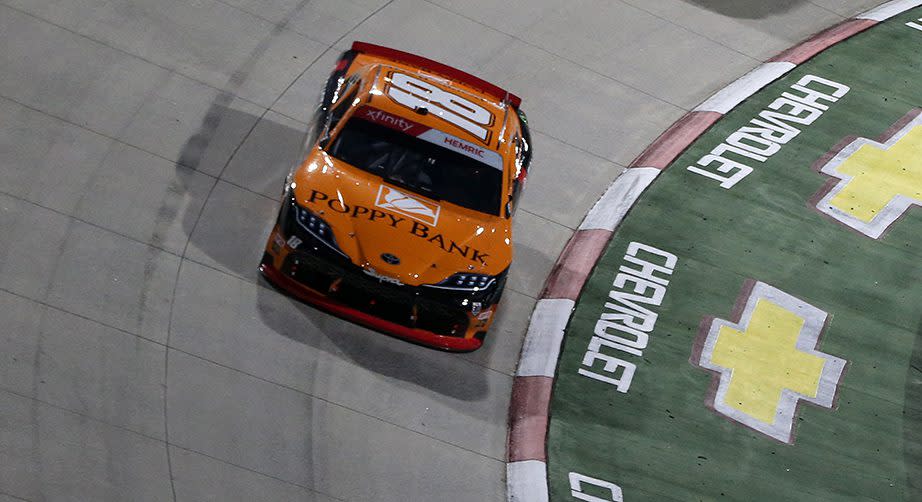 MARTINSVILLE, VIRGINIA - OCTOBER 30: Daniel Hemric, driver of the #18 Poppy Bank Toyota, Justin Allgaier, driver of the #7 Hellmann\