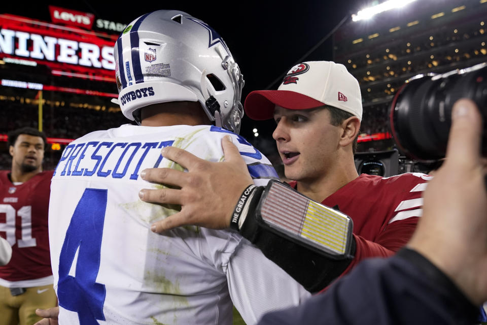 Dallas Cowboys quarterback Dak Prescott (4) greets San Francisco 49ers quarterback Brock Purdy after an NFL divisional round playoff football game in Santa Clara, Calif., Sunday, Jan. 22, 2023. (AP Photo/Godofredo A. Vásquez)