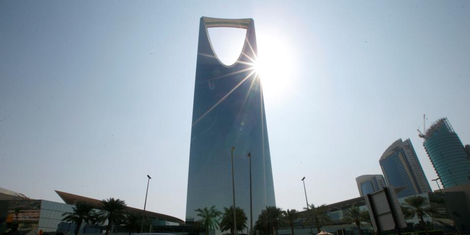 FILE PHOTO: A car drives past the Kingdom Centre Tower in Riyadh, Saudi Arabia, November 12, 2017. Picture taken November 12, 2017. REUTERS/Faisal Al Nasser