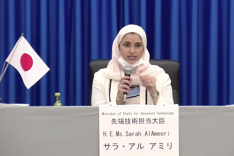 In this image made from a video, Sarah AlAmeeri of United Arab Emirates' Ministry of Advanced Technology attends a news conference at Tanegashima Space Center on a small southern Japanese island after a launch of a United Arab Emirates spacecraft Monday, July 20, 2020. A United Arab Emirates spacecraft rocketed away Monday on a seven-month journey to Mars, kicking off the Arab world’s first interplanetary mission. (MHI via AP Photo)