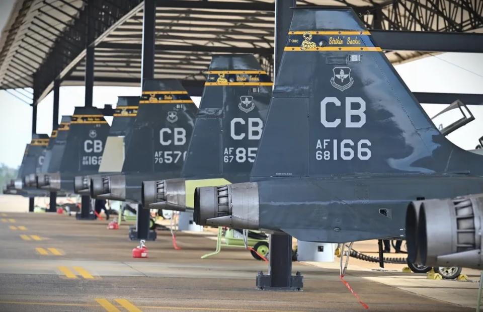T-38 Talons from the 14th Flying Training Wing sit under a hangar on Jan. 7, 2022, at Columbus Air Force Base, Miss. (Senior Airman Davis Donaldson/Air Force)