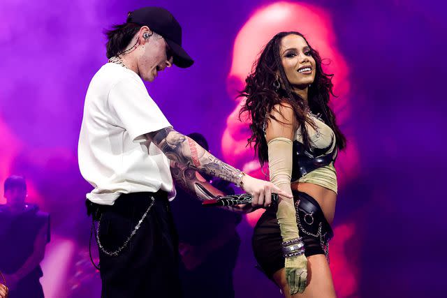 <p>Frazer Harrison/Getty </p> Peso Pluma and Anitta perform at Coachella 2024