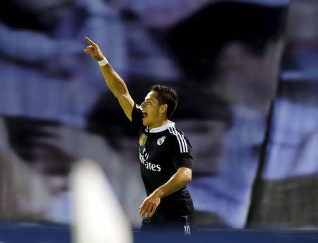 Real Madrid's Javier Hernandez "Chicharito" celebrates his goal against Celta Vigo during their Spanish first division soccer match at Balaidos stadium in Vigo April 26, 2015. REUTERS/Miguel Vidal