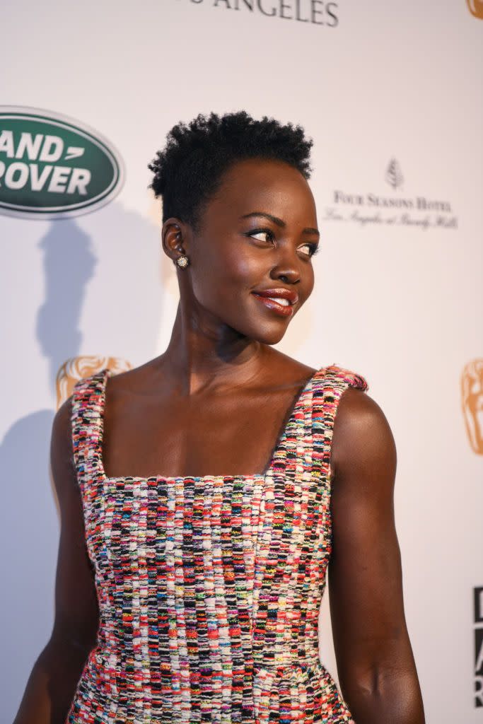 <p>The classic pixie cut—with cropped sides and length at the top—shines on Lupita Nyong'o. Style it with loosely defined curls, or sweep the longest pieces forward as bangs.</p>