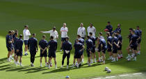 Croatia players listen to Croatia's manager Zlatko Dalic, centre, during a team training session at Wembley stadium in London, Saturday, June 12, 2021 the day before the Euro 2020 soccer championship group D match between England and Croatia. (Justin Tallis/Pool via AP)