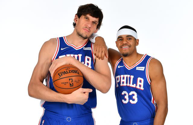 <p>Jesse D. Garrabrant/NBAE via Getty </p> Boban Marjanovic #51 and Tobias Harris #33 of the Philadelphia 76ers pose for a portrait on February 7, 2019 at the Philadelphia 76ers Training Complex in Camden, New Jersey.