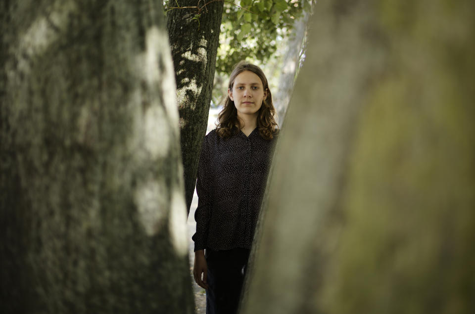 Climate activist Lina Schinkoethe with the group Uprising of the Last Generation poses for a portrait after an interview with The Associated Press in Berlin, Germany, Tuesday, July 5, 2022. The group claims the world has only a few years left to turn the wheel around and avoid catastrophic levels of global warming. (AP Photo/Markus Schreiber)