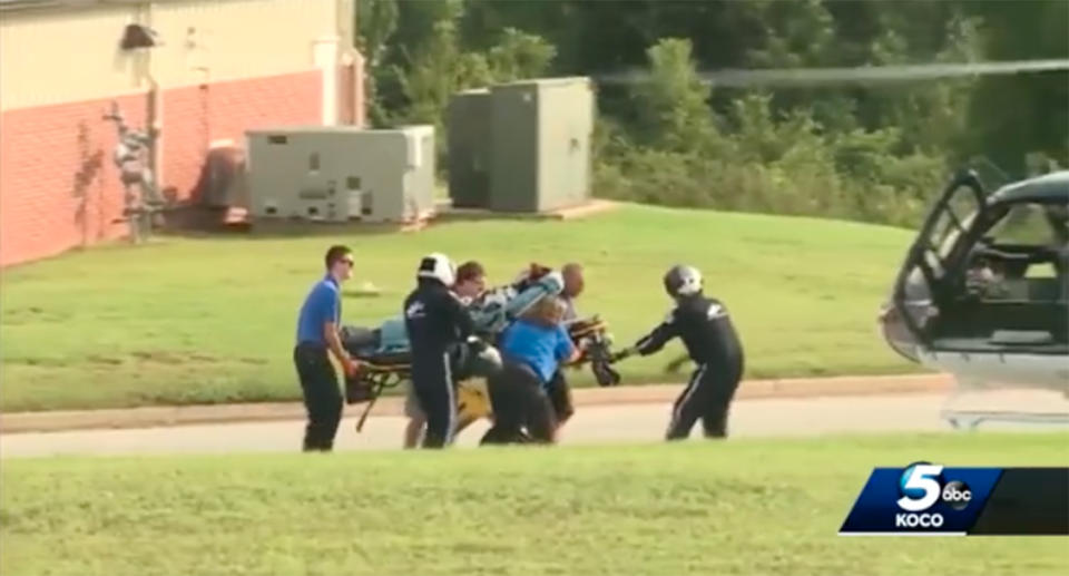 The 14-year-old victim is transported to hospital by helicopter after being stabbed 9 to 11 times. Source: KOCO/ABC5